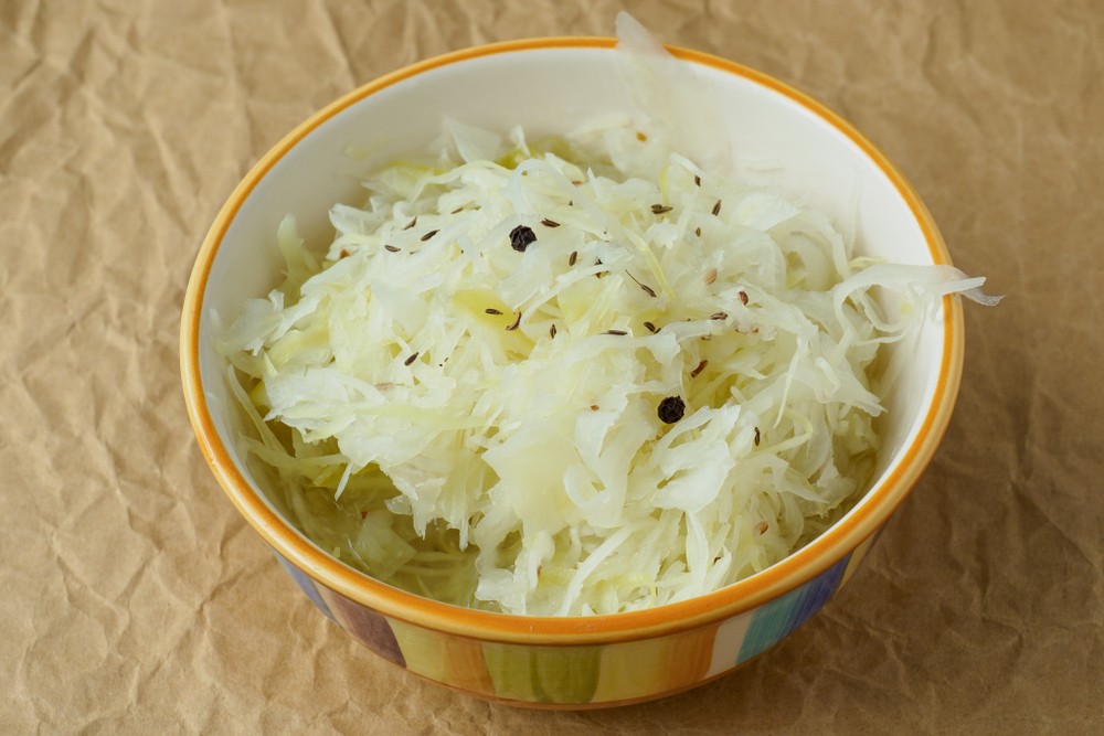 kebiasaan makan orang Jerman adalah menikmati sauerkraut.
